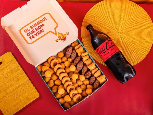 150 Salgadinhos + Coca-Cola Grande